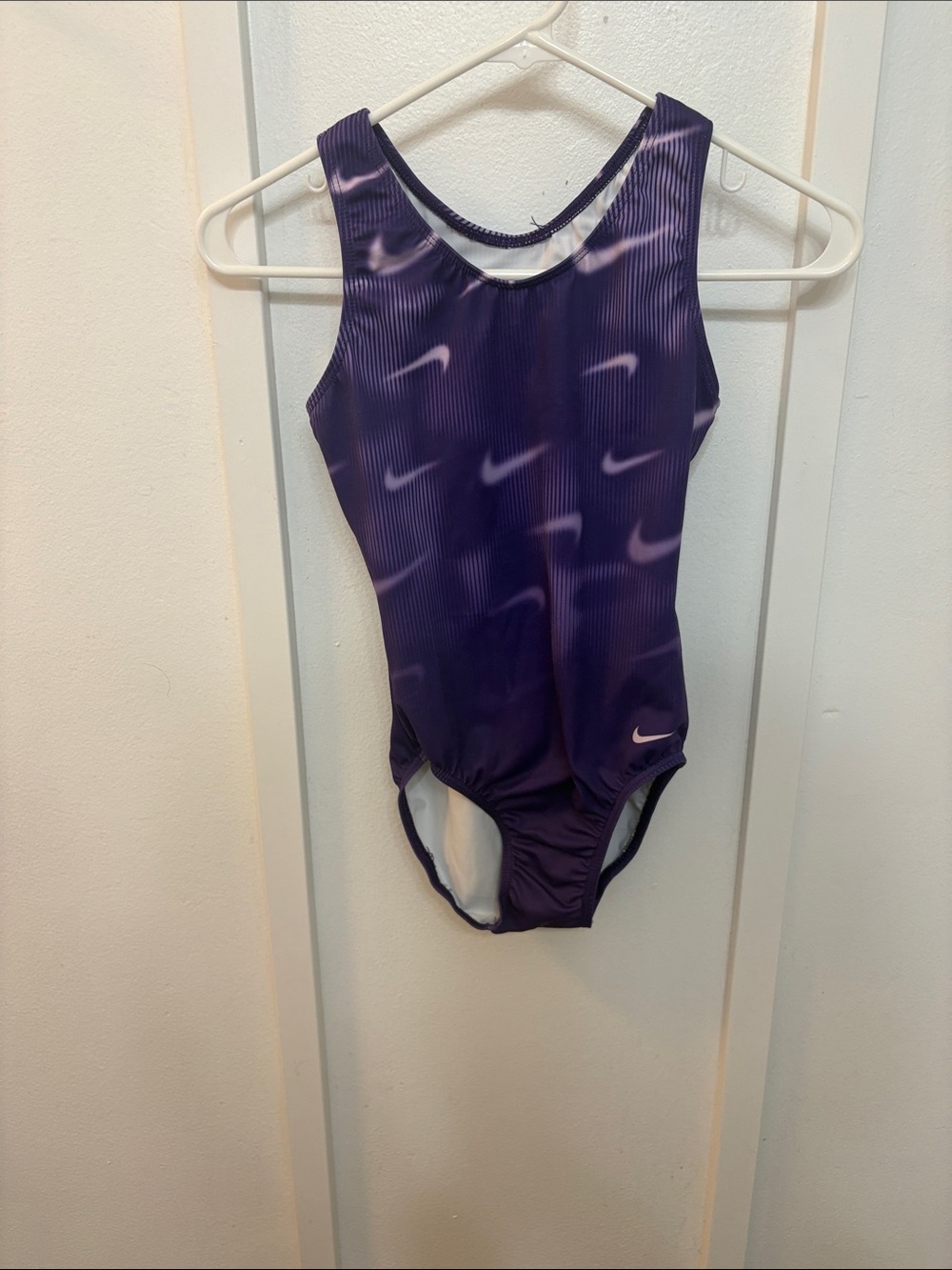 Nike Girls' Purple gymnastics leotard with Subtle Swoosh Pattern